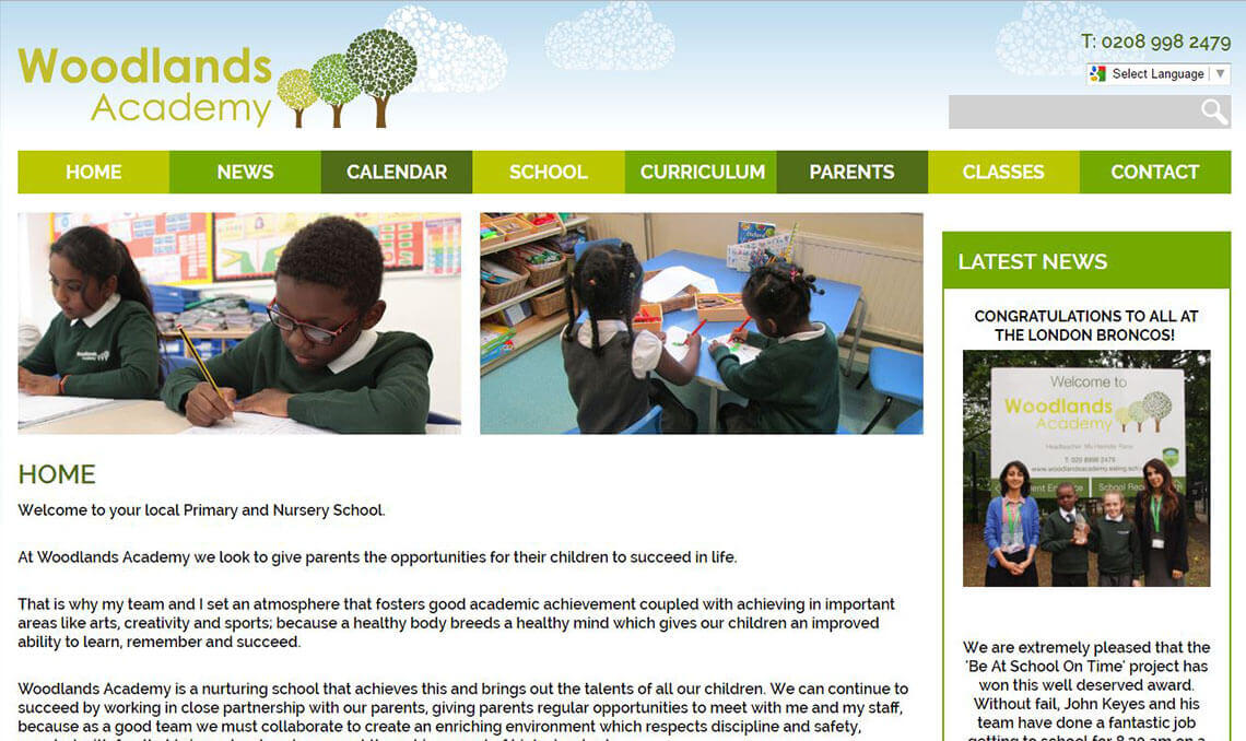 Screenshot of Woodlands Academy website showing children learning, introduction text and latest news panel.