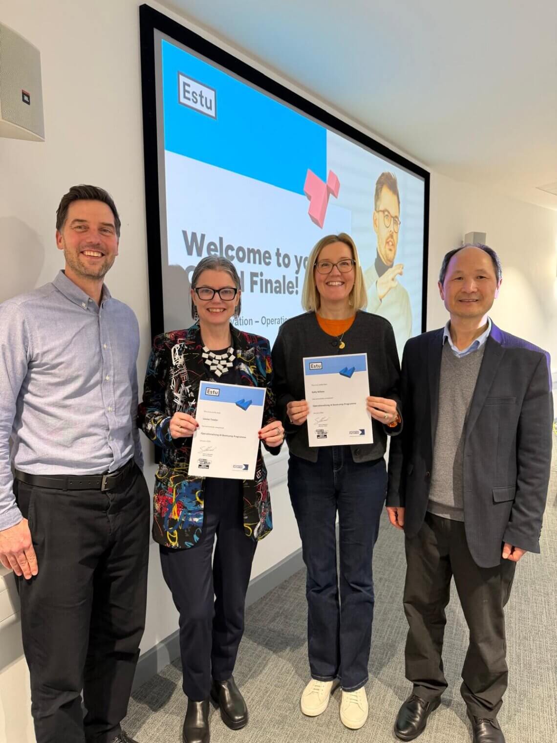 Louise and Kelly receiving their certificates